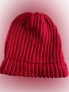 Handmade cozy red knit beanie hat for adults.